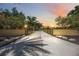 Long gated driveway to the property, creating a sense of privacy and grandeur at 4225 Ulman Ave, North Port, FL 34286