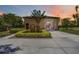 Detached garage with car lift, offering ample parking and storage space at 4225 Ulman Ave, North Port, FL 34286