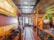 Unique hallway with wood floors, a decorative ceiling, and artistic details at 4225 Ulman Ave, North Port, FL 34286