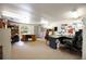 Spacious office with multiple desks, neutral carpet, and natural light at 4225 Ulman Ave, North Port, FL 34286