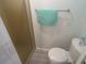 Cozy bathroom with a commode, towel rack, and stand up shower provides a clean, comfortable space at 5119 Glen Echo Ave, Sarasota, FL 34234