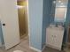 Bathroom features a sleek vanity, well-lit mirror, and a stand up shower with a clear glass door at 5119 Glen Echo Ave, Sarasota, FL 34234