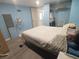 Bedroom featuring a bed, a fan, and a closet at 5119 Glen Echo Ave, Sarasota, FL 34234