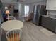 Open-concept living area connects the kitchen and living spaces, creating an ideal flow for modern living at 5119 Glen Echo Ave, Sarasota, FL 34234