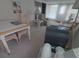Cozy living room with dining area and comfortable seating arrangement at 5119 Glen Echo Ave, Sarasota, FL 34234