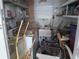 Well-organized storage room with shelving, bike and cleaning supplies, maximizing space and efficiency at 5119 Glen Echo Ave, Sarasota, FL 34234