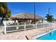 Tiki hut by the pool, a great spot for relaxing and socializing at 5119 Glen Echo Ave, Sarasota, FL 34234