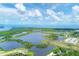 Stunning aerial view of Robinson Preserve, showcasing beautiful waterways, walking trails, and diverse habitats at 523 Wildlife Gln, Bradenton, FL 34209