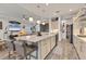Spacious, modern kitchen with a large island, stainless steel appliances, and an open layout perfect for entertaining at 523 Wildlife Gln, Bradenton, FL 34209