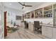 Spacious office featuring custom built-ins, sleek desks, and comfortable seating, ideal for remote work at 523 Wildlife Gln, Bradenton, FL 34209