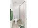 Compact bathroom featuring a toilet, towel rack, and shower/tub combination, designed for functionality and comfort at 5333 Coral Reef Way, Bradenton, FL 34211
