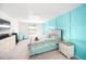 Light filled bedroom featuring seaside themed decor and stylish furniture at 5333 Coral Reef Way, Bradenton, FL 34211