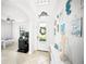 Light-filled entryway featuring decor and foosball table in game room at 5333 Coral Reef Way, Bradenton, FL 34211