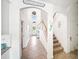 Bright entryway featuring tile floors, soaring ceilings, and staircase at 5333 Coral Reef Way, Bradenton, FL 34211