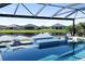 A private spa and pool with scenic lake views enhance this lovely property, perfect for outdoor relaxation at 5333 Coral Reef Way, Bradenton, FL 34211
