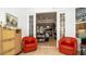 Inviting sitting room with stylish furnishings, bright natural light, and an open view of the interior living spaces at 553 Meadow Sweet Cir, Osprey, FL 34229