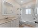 Clean, well-lit bathroom with a modern vanity, and a shower-tub combo for a comfortable and functional space at 5709 13Th W Ave, Bradenton, FL 34209