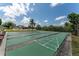 Active shuffleboard courts surrounded by lush landscaping and trees at 5709 13Th W Ave, Bradenton, FL 34209