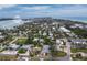Aerial shot of the property highlighting shoreline views, nearby waterways, and community features at 580 Russell St, Longboat Key, FL 34228