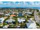 Captivating aerial view of a waterfront property with boat docks and gorgeous open water views in the Florida Keys at 602 Baronet Ln, Holmes Beach, FL 34217