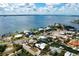 Aerial view of stunning waterfront property, highlighting the prime location and access to the beautiful bay at 602 Baronet Ln, Holmes Beach, FL 34217