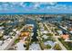 Expansive aerial view showing the neighborhood with canals and boating docks of a beautiful community in the Florida Keys at 602 Baronet Ln, Holmes Beach, FL 34217