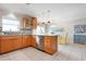 Modern kitchen with stainless steel appliances, stylish cabinetry, and a functional layout at 602 Baronet Ln, Holmes Beach, FL 34217
