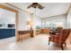 Inviting living room with wood paneling, tile floor, and a comfortable layout at 602 Baronet Ln, Holmes Beach, FL 34217