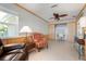 Bright office space with comfortable seating, built-ins, and natural light at 602 Baronet Ln, Holmes Beach, FL 34217