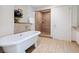 Elegant bathroom with a standalone tub and walk-in shower at 6512 Midnight Pass Rd # 303, Sarasota, FL 34242