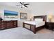 Cozy bedroom featuring a large dresser, and stylish lamps at 6512 Midnight Pass Rd # 303, Sarasota, FL 34242