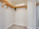 This closet features ample shelving to maximize storage space at 6512 Midnight Pass Rd # 303, Sarasota, FL 34242