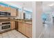 Open kitchen layout with granite counters and stainless steel appliances at 6512 Midnight Pass Rd # 303, Sarasota, FL 34242