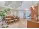 Open-concept dining space adjacent to the foyer, bathed in natural light and modern accents at 6539 Flycatcher Ln, Lakewood Ranch, FL 34202