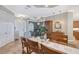 Open floor plan with sightlines into the dining and sitting areas, with natural light at 6539 Flycatcher Ln, Lakewood Ranch, FL 34202
