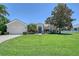 Charming single-story home with well-manicured lawn and mature landscaping at 6539 Flycatcher Ln, Lakewood Ranch, FL 34202
