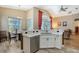 Contemporary kitchen featuring stainless steel appliances, a breakfast nook, and ample counter space at 6605 38Th E Ln, Sarasota, FL 34243