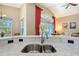Close up of the kitchen sink featuring stainless steel appliances and countertops at 6605 38Th E Ln, Sarasota, FL 34243