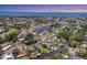 Scenic aerial view of the neighborhood featuring waterfront homes and access to the bay at 6931 Magellan Way, Sarasota, FL 34243