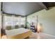 Inviting bedroom with large windows and stylish decor at 6931 Magellan Way, Sarasota, FL 34243