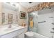 Bright bathroom with a shower-tub combo and neutral decor at 7193 W Country Club N Dr # 137, Sarasota, FL 34243