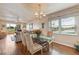 Inviting dining room flows seamlessly into the living space with serene views at 7193 W Country Club N Dr # 137, Sarasota, FL 34243