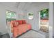 Bright studio apartment with an open door, a cozy daybed, and backyard views at 720 37Th W St, Bradenton, FL 34205