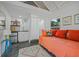 Studio apartment featuring a daybed, kitchenette, and shower at 720 37Th W St, Bradenton, FL 34205