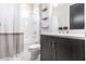 Well-appointed bathroom with a shower-tub combo, vanity, and coordinated fixtures at 7208 Prestbury Cir, Bradenton, FL 34202