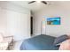 Bedroom with TV, closet and large mirror at 7208 Prestbury Cir, Bradenton, FL 34202