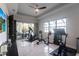 Bright exercise room with a variety of equipment and a view at 7208 Prestbury Cir, Bradenton, FL 34202