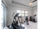 A home gym with workout equipment and a view at 7208 Prestbury Cir, Bradenton, FL 34202