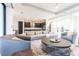 Large open living room with tile flooring and access to the kitchen makes it an ideal space for gatherings and daily living at 7208 Prestbury Cir, Bradenton, FL 34202