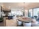 Spacious open floor plan with kitchen, dining area, and living room, all featuring modern décor at 7208 Prestbury Cir, Bradenton, FL 34202